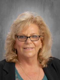Lori Hughes, Secretary